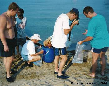 Photographing a fisherman's catch.